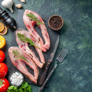 top-view-fresh-fish-slices-with-red-tomatoes-dark-background-scaled.jpg top-view-fresh-fish-slices-with-red-tomatoes-dark-background-scaled.jpg